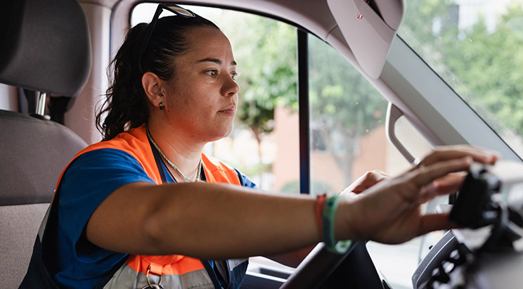 Woman_In_Car_Wearing_SafetyVest