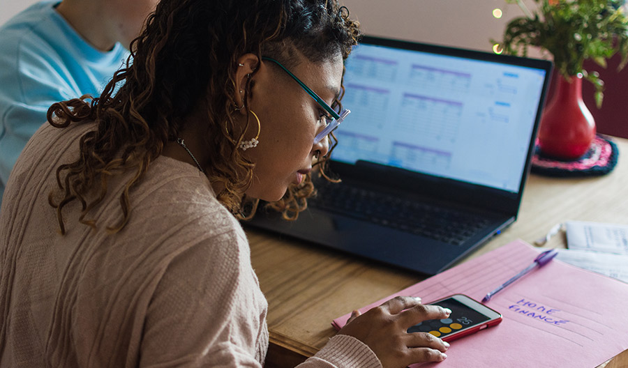 Woman calculating home finances
