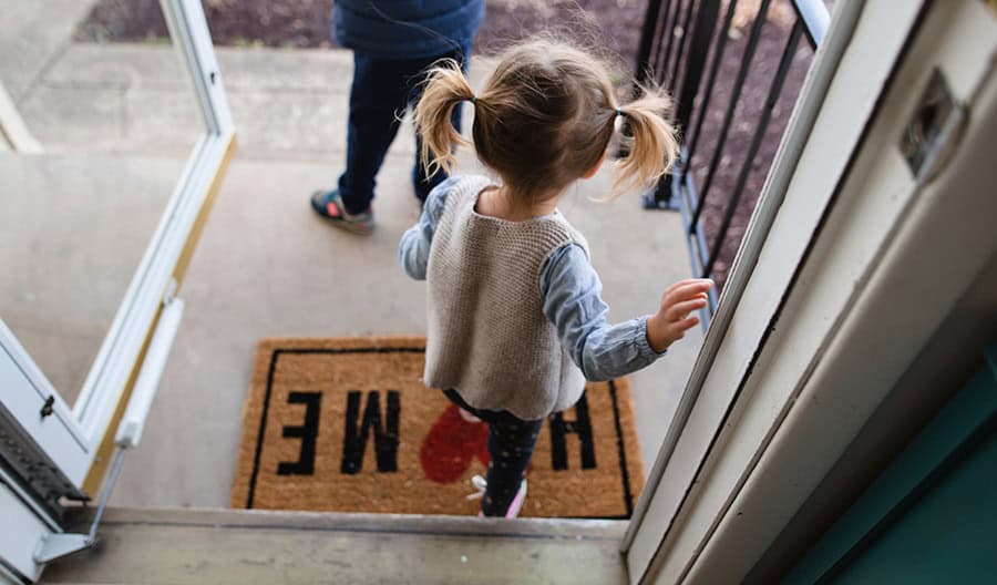 Little-Girl-With-Pigtails-At-Home