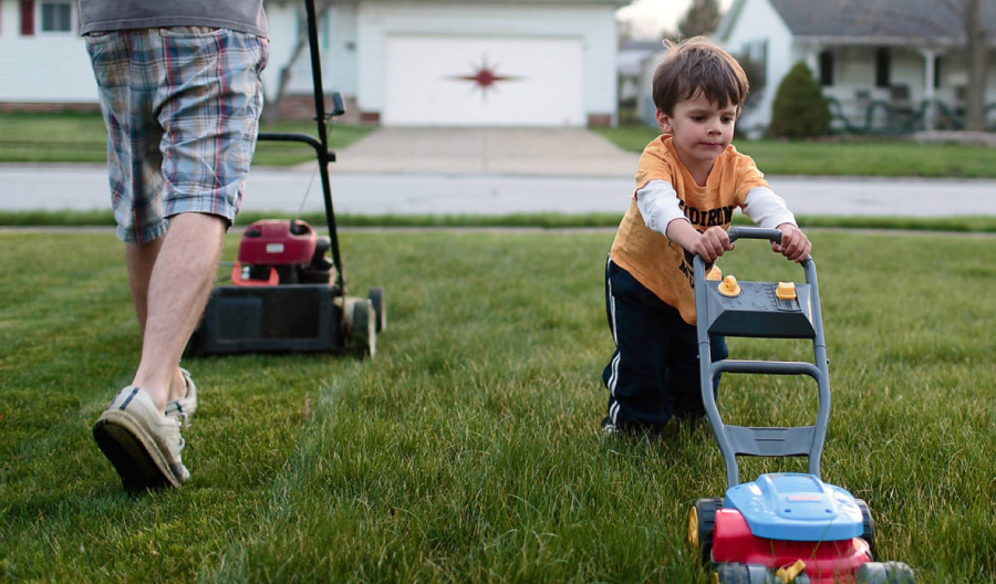 Child with lawnmower